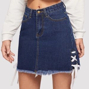 Eyelet lace up raw hem denim skirt